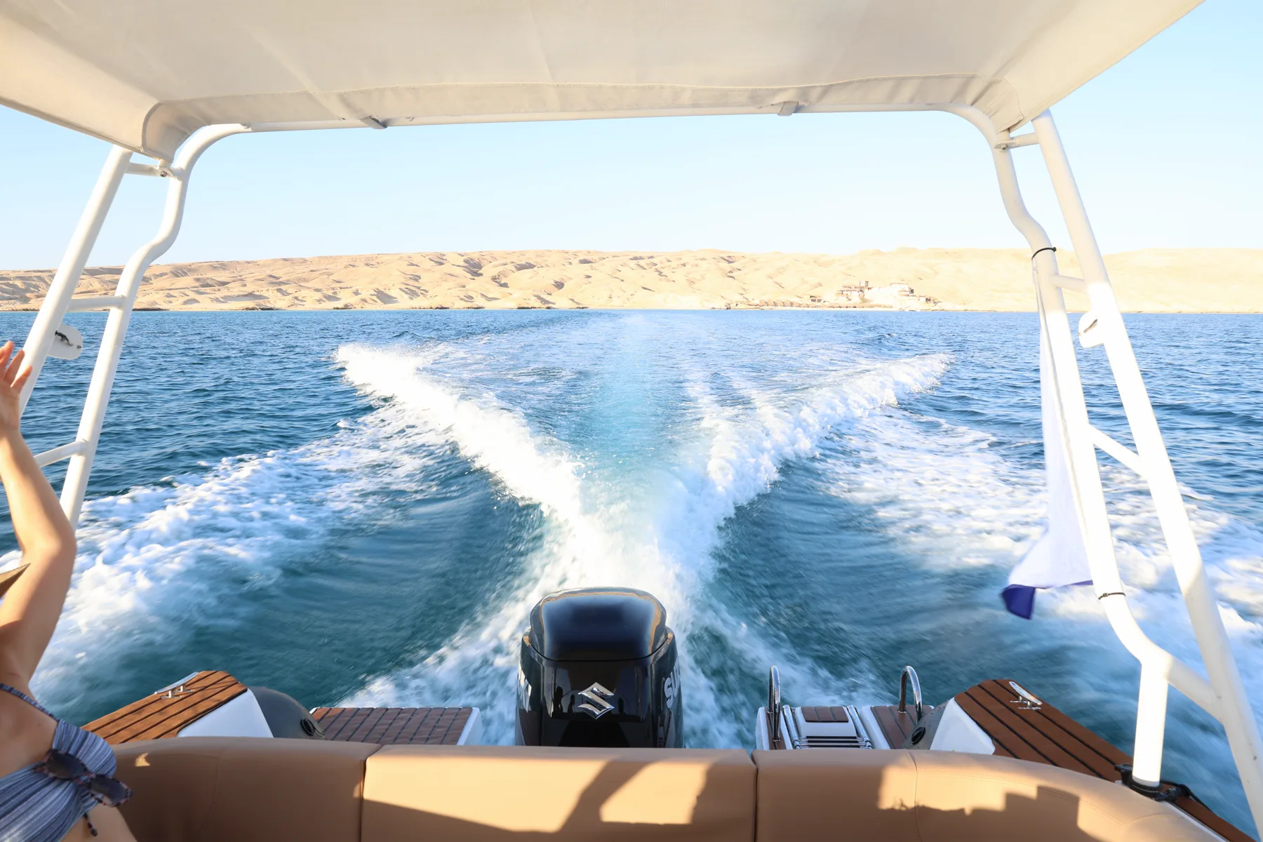 Guests planning their route aboard a MARO Red Sea speedboat